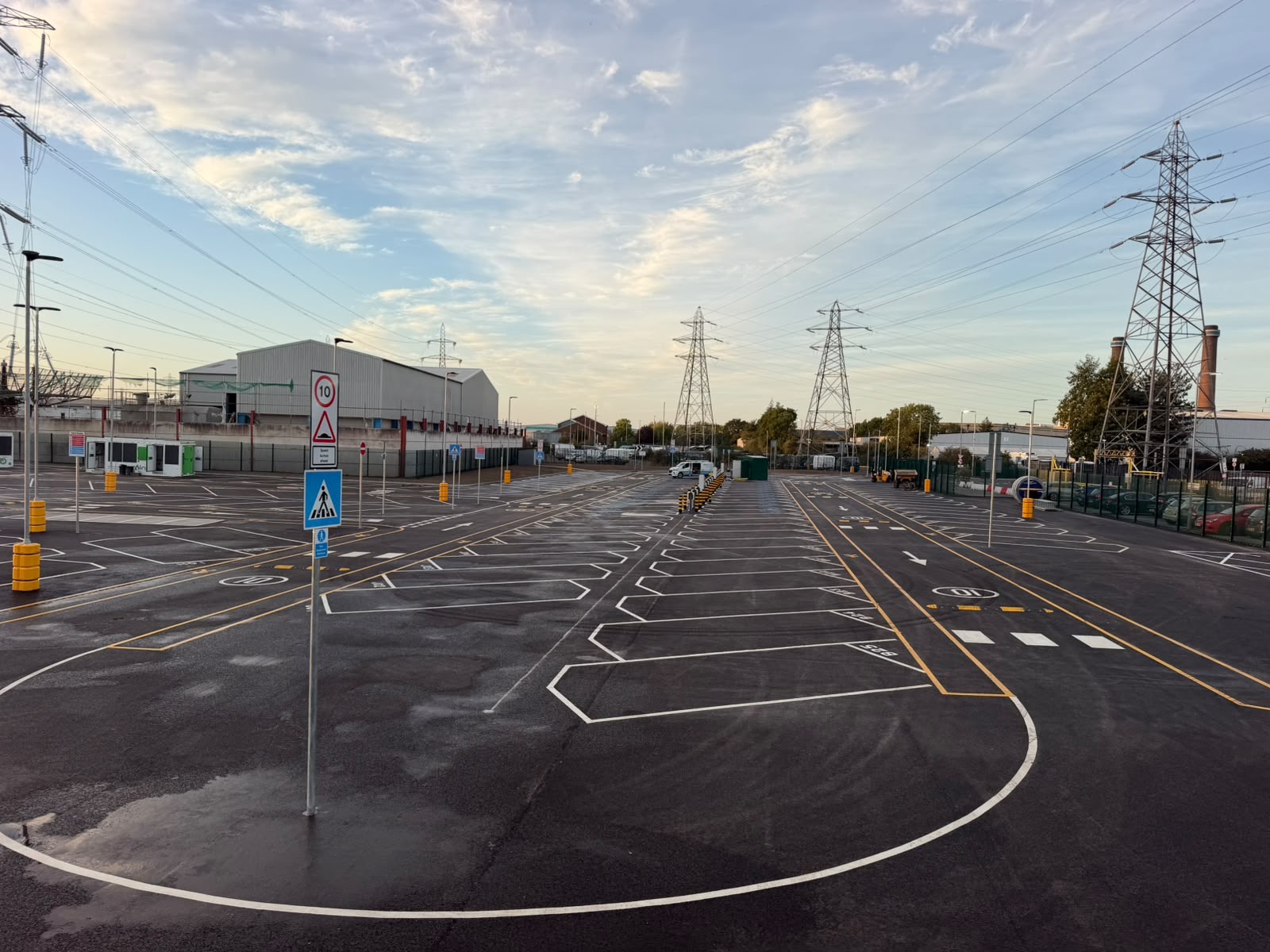 Large commercial car park line marking with numbered bays, routes and crossings by Ulteum Marking