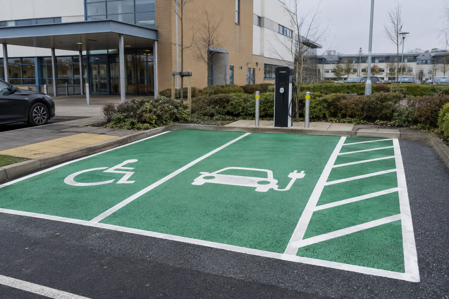 Accessible EV charging bay with access aisle and clear markings