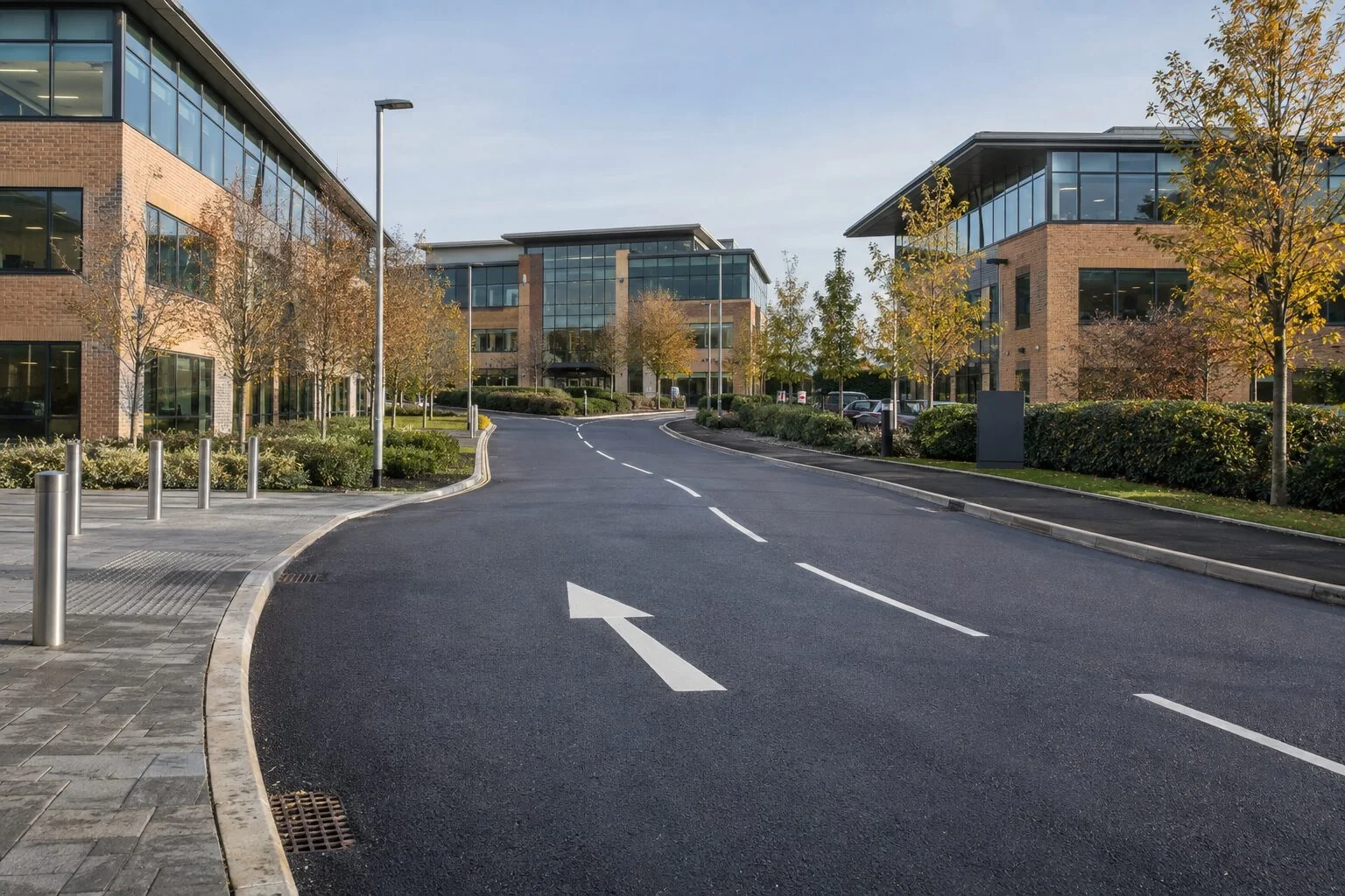 Freshly surfaced private access road through a UK business park